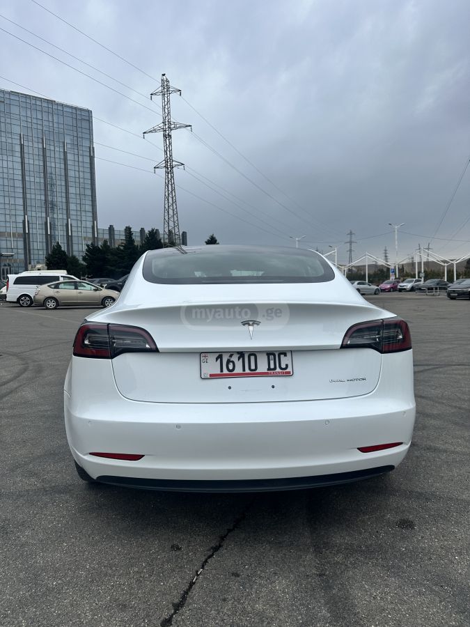Tesla Model 3 - фото 7