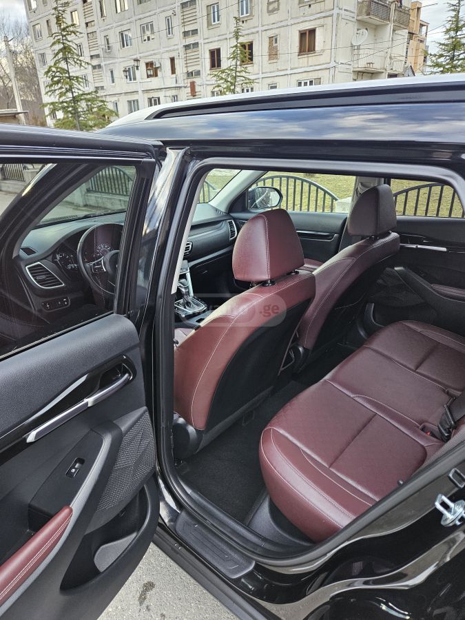 Kia Seltos - фото 9