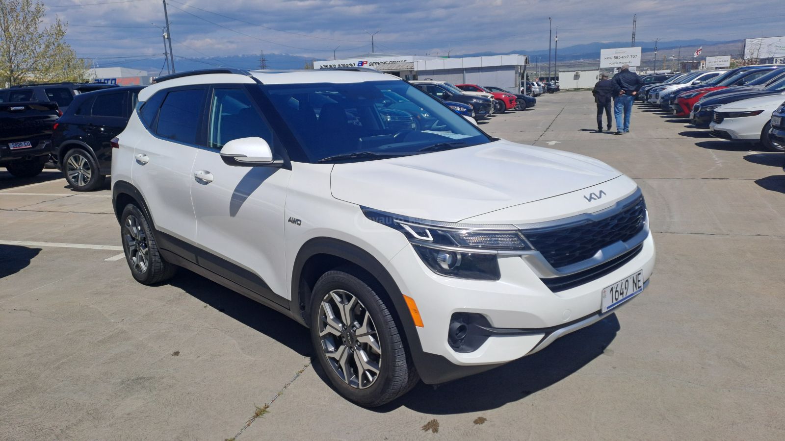 Kia Seltos - фото 1