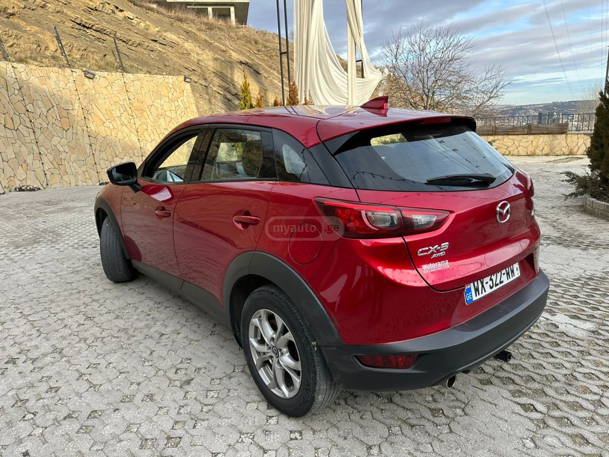 Mazda CX-3 - фото 11