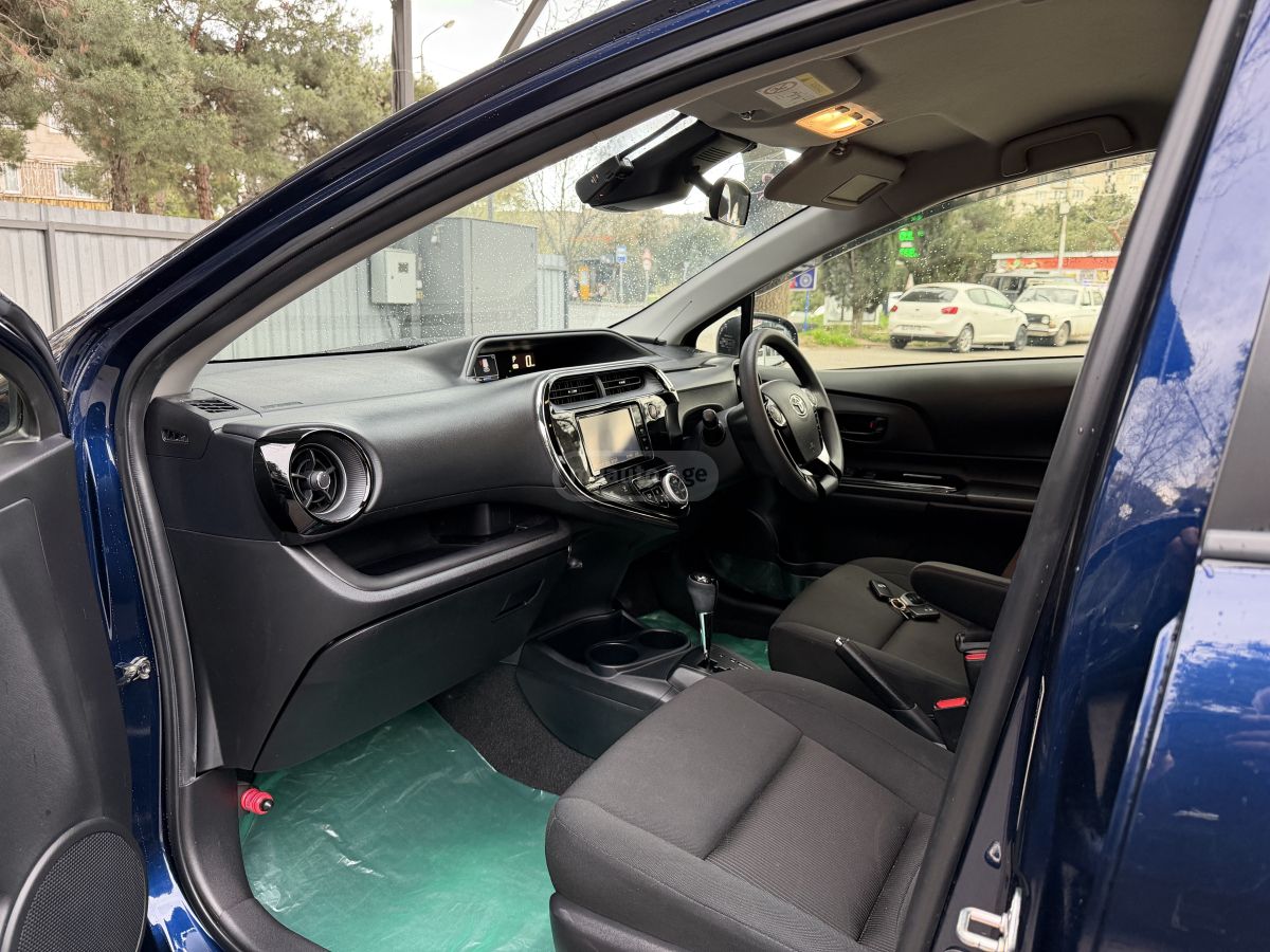 Toyota Aqua - фото 11