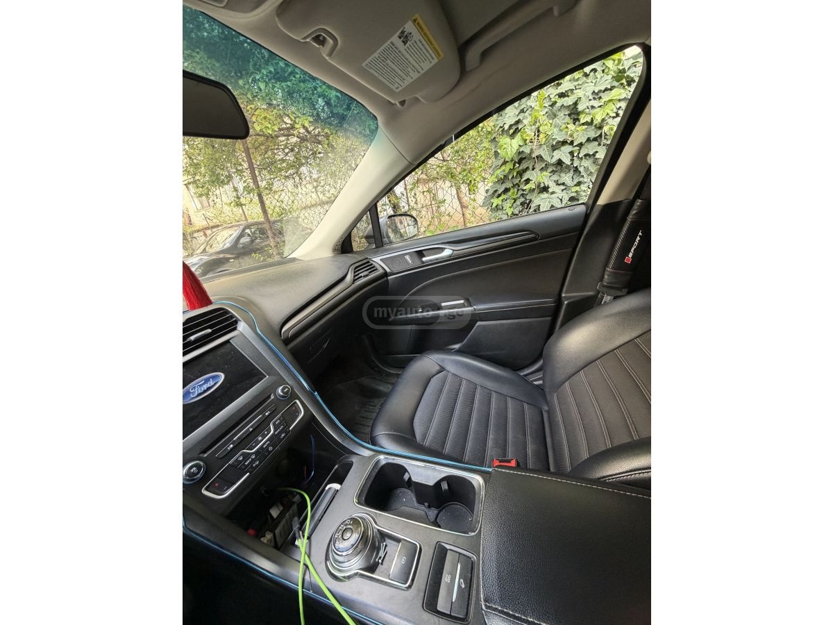 Ford Fusion - фото 7