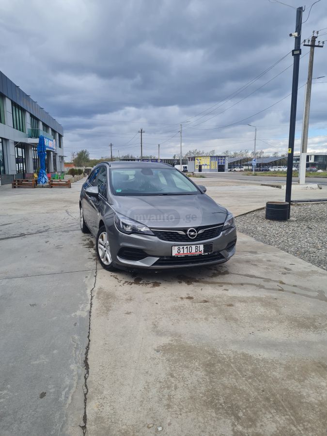 Opel Astra - фото 1