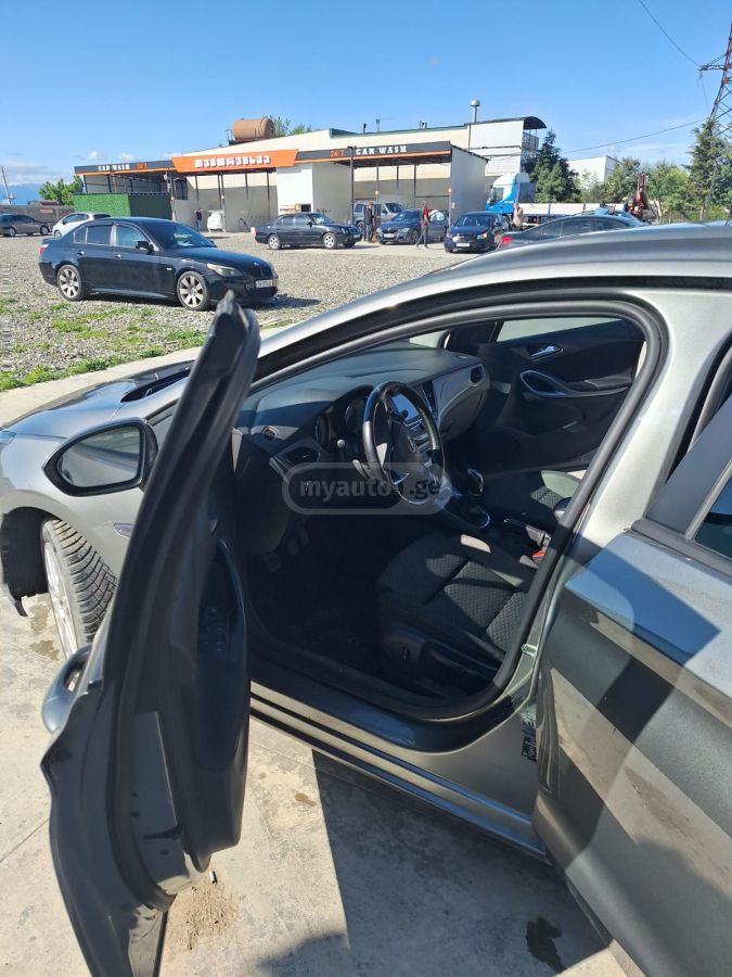 Opel Astra - фото 7