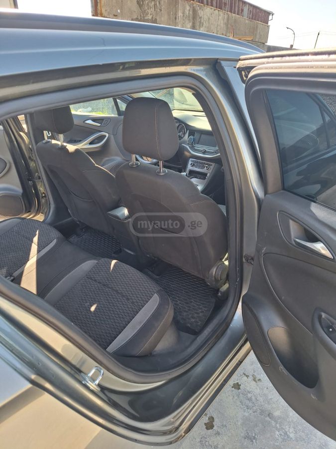 Opel Astra - фото 8