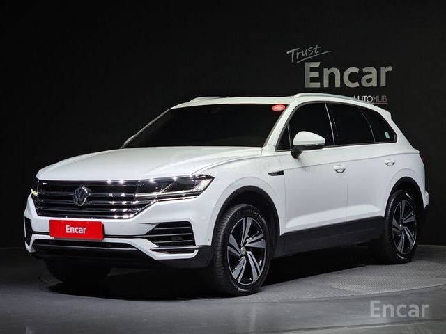 Volkswagen Touareg - фото 1