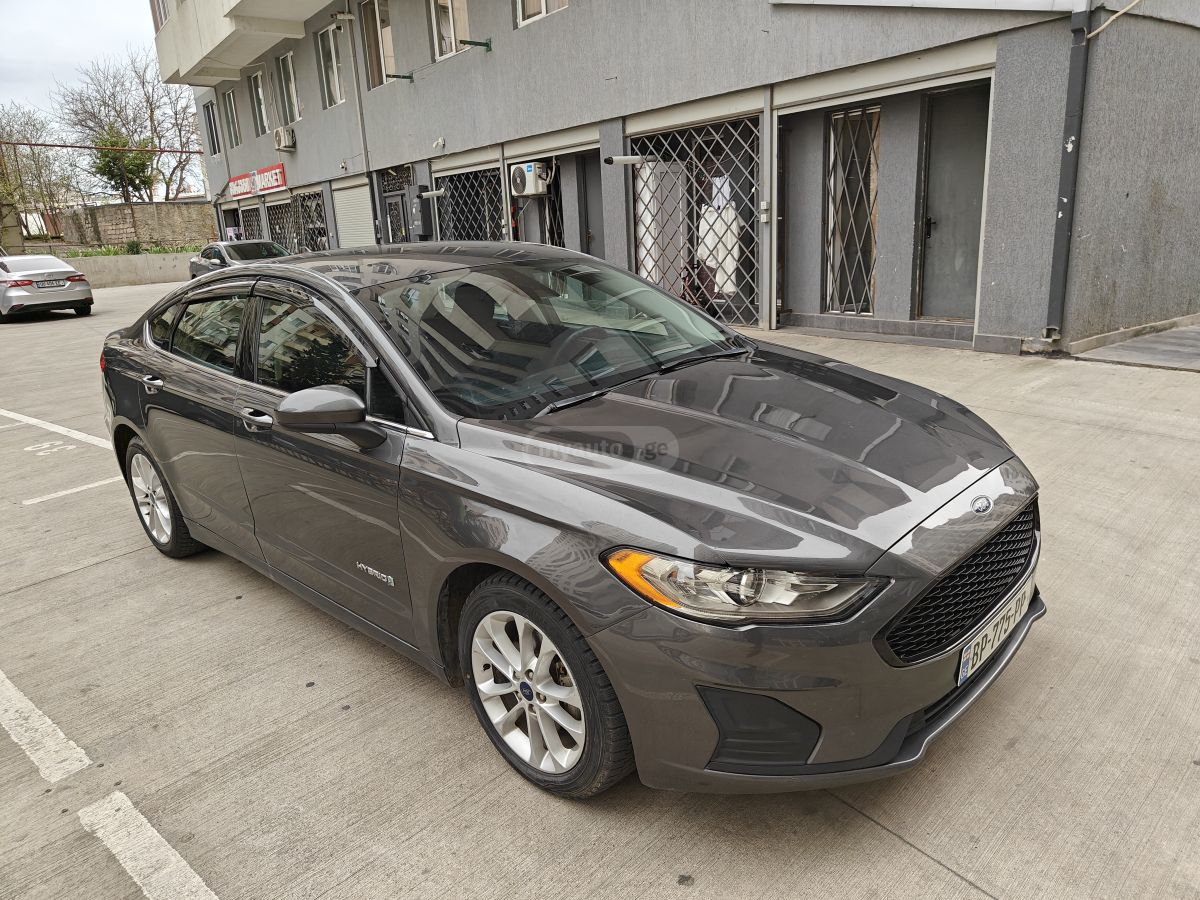 Ford Fusion - фото 9