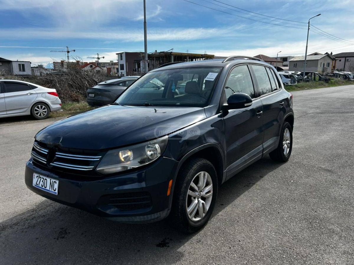 Volkswagen Tiguan - фото 1