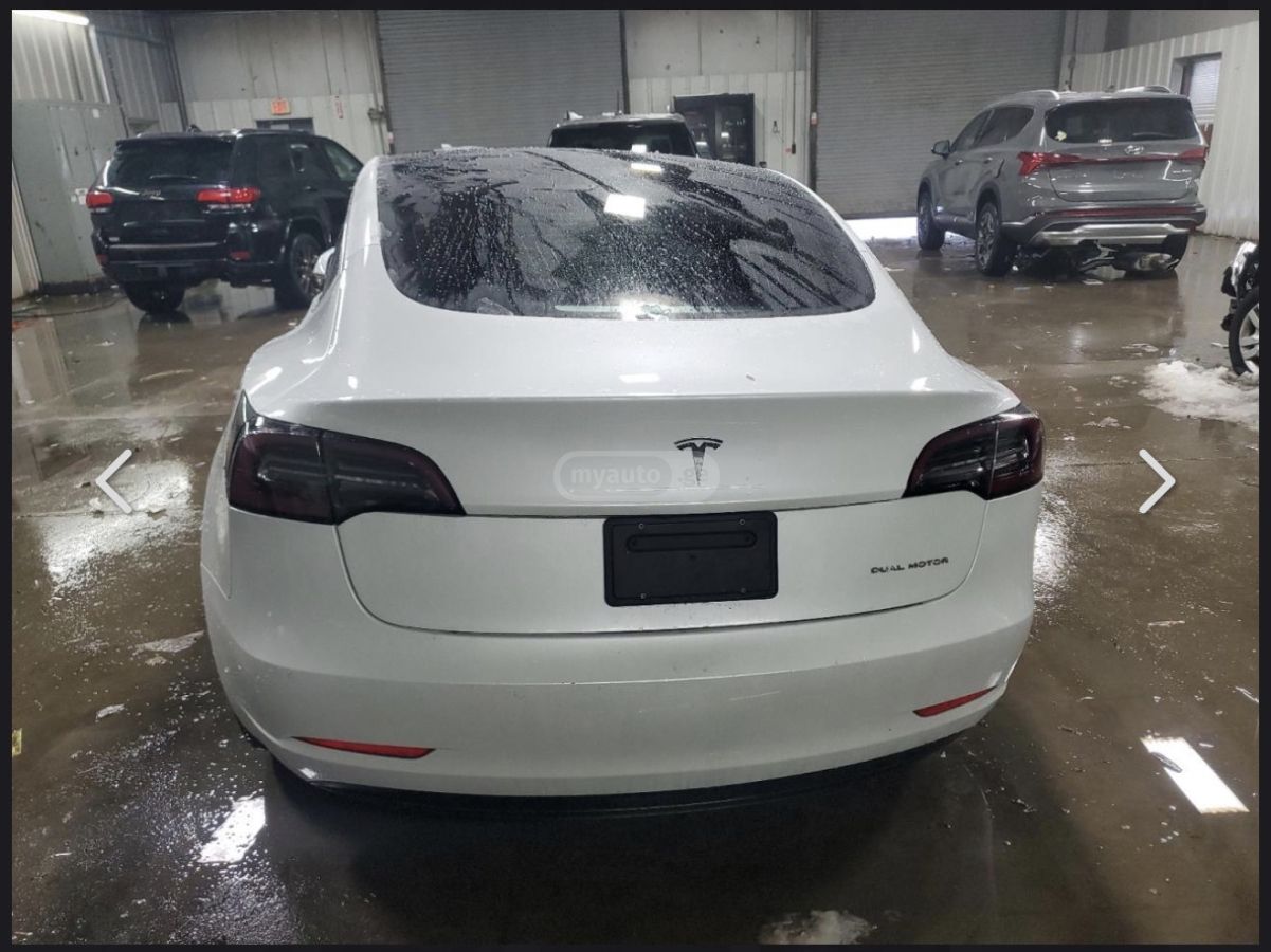 Tesla Model 3 - фото 10