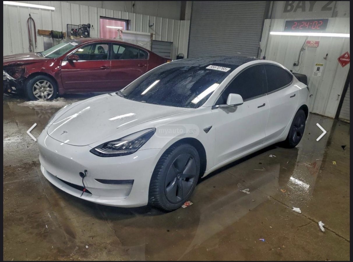 Tesla Model 3 - фото 2