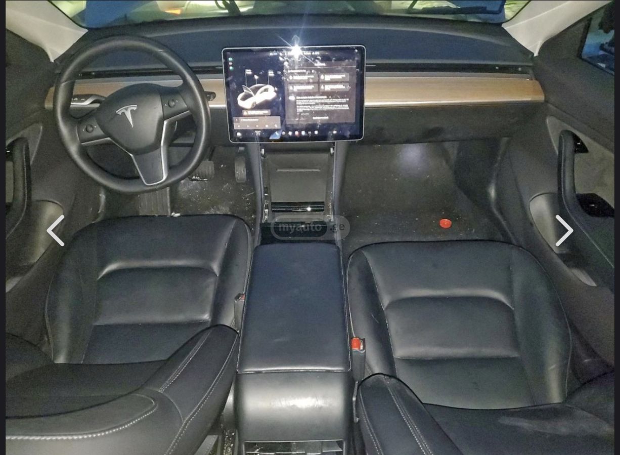 Tesla Model 3 - фото 8