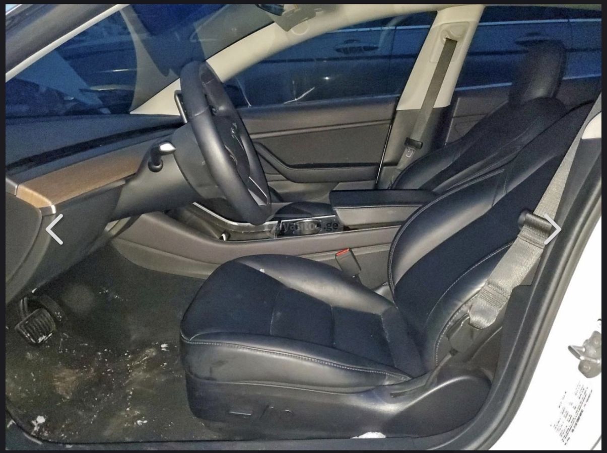 Tesla Model 3 - фото 9