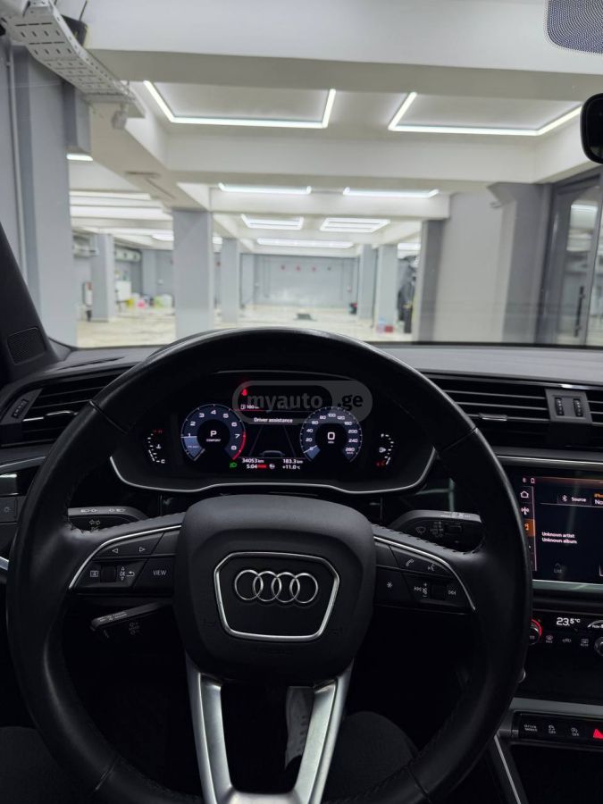 Audi Q3 - фото 11