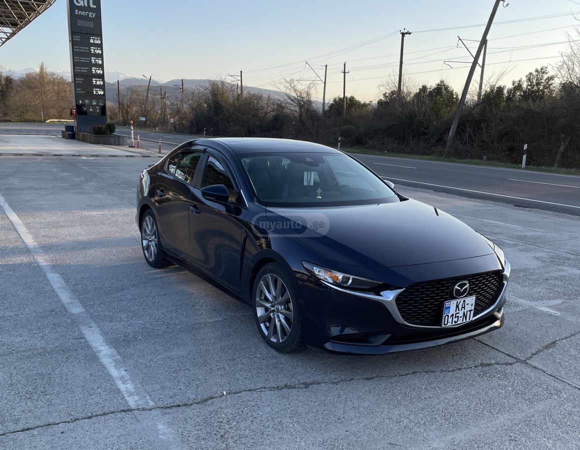 Mazda Mazda 3 - фото 2