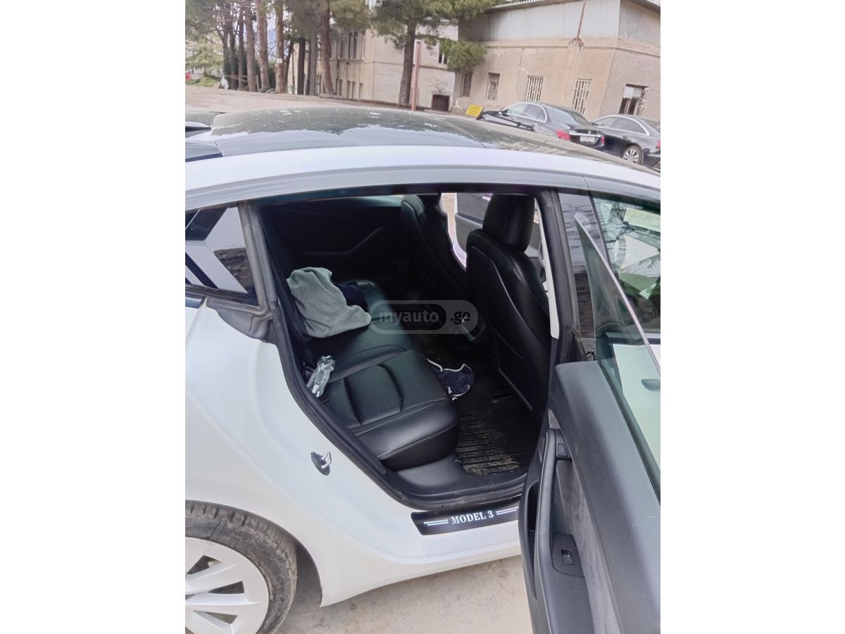 Tesla Model 3 - фото 10