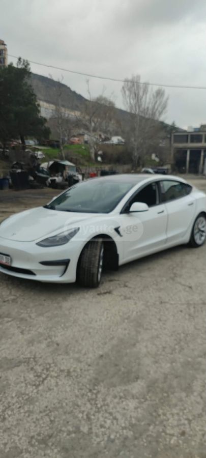 Tesla Model 3 - фото 6