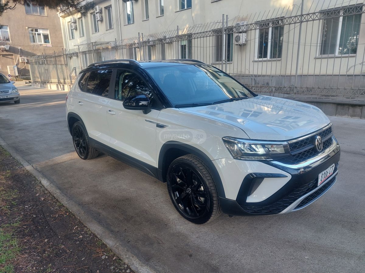 Volkswagen Taos - фото 1