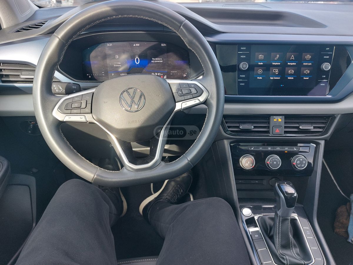 Volkswagen Taos - фото 11