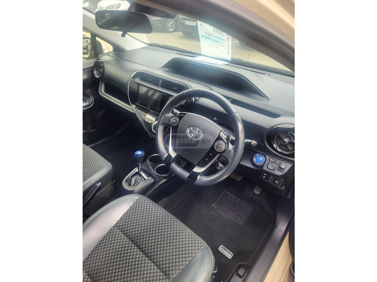 Toyota Aqua - фото 7