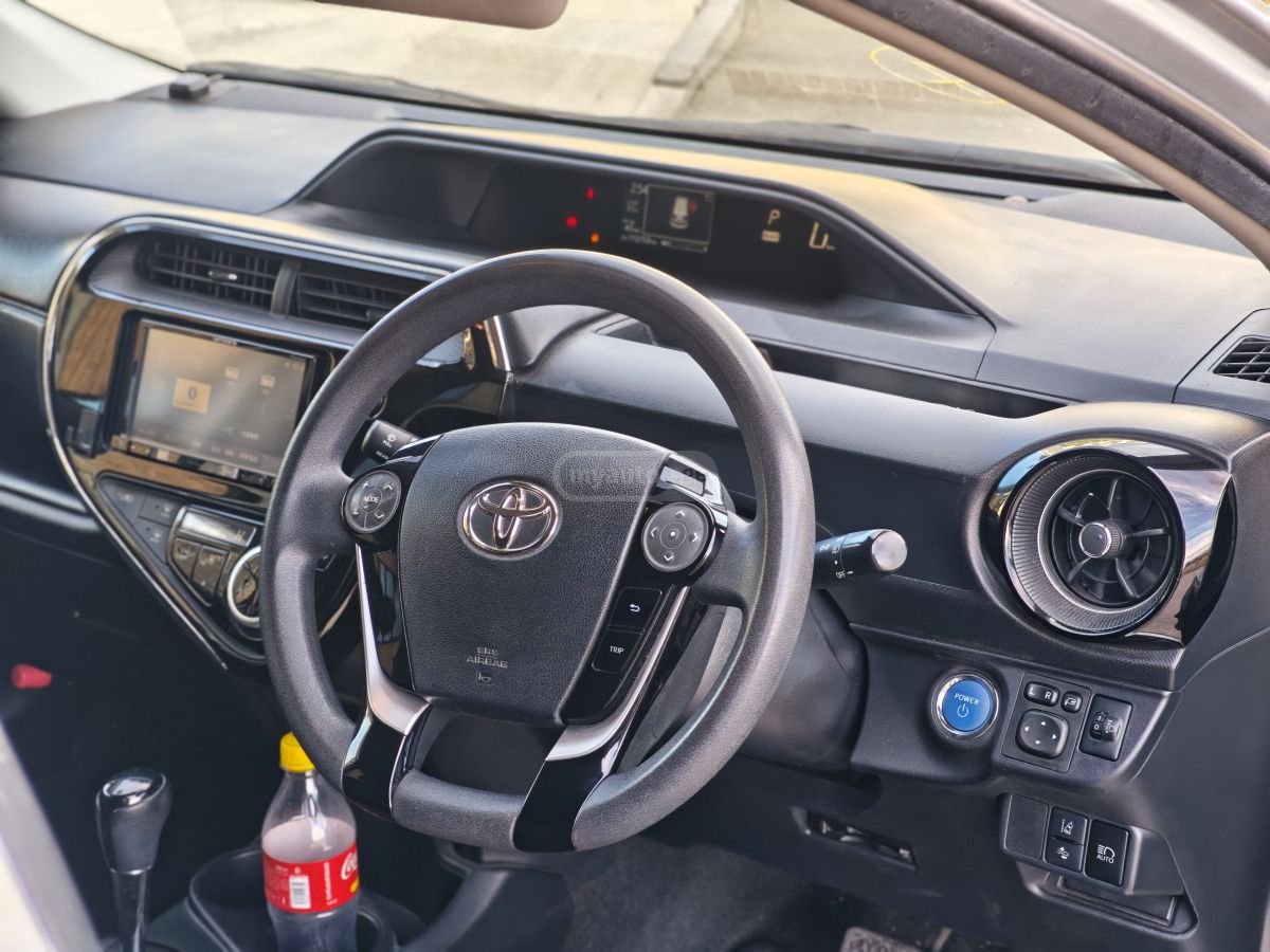 Toyota Aqua - фото 11