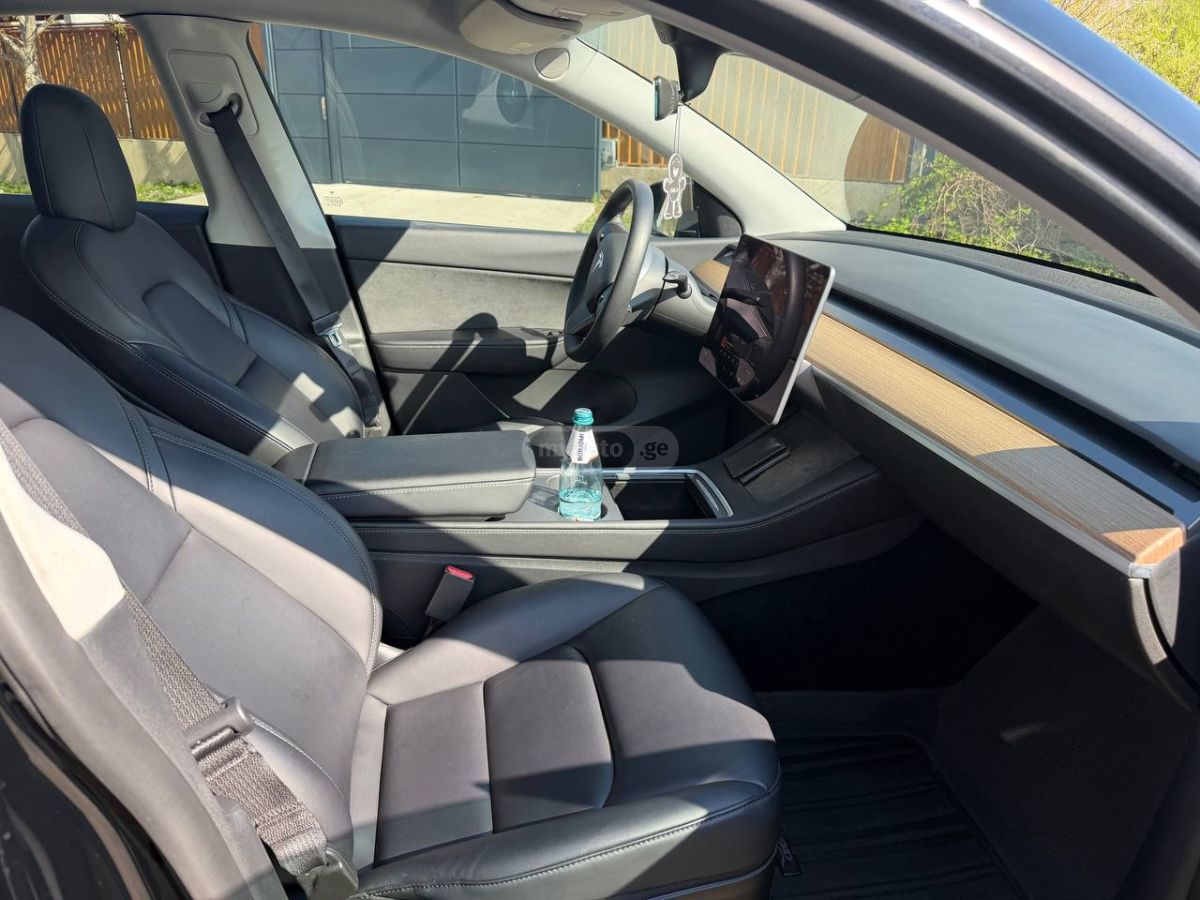 Tesla Model Y - фото 5