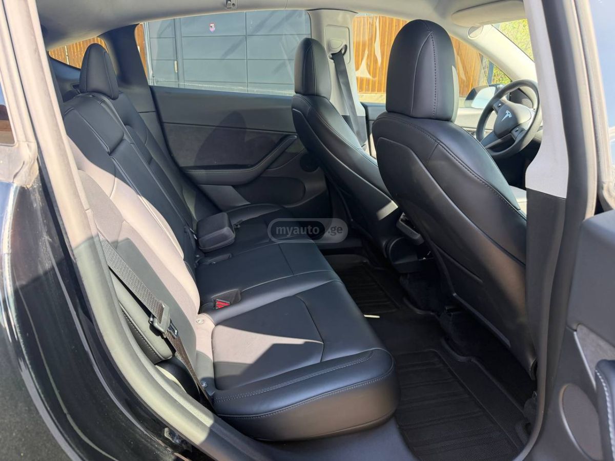 Tesla Model Y - фото 7