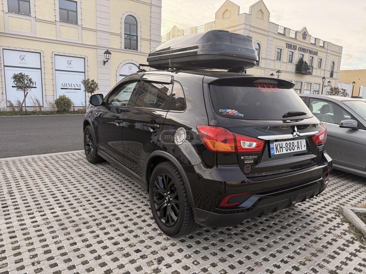 Mitsubishi Outlander Sport - фото 1