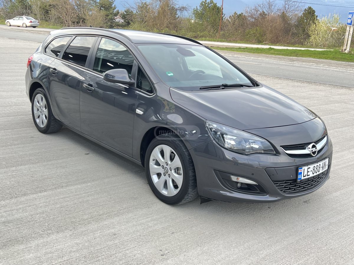 Opel Astra - фото 1