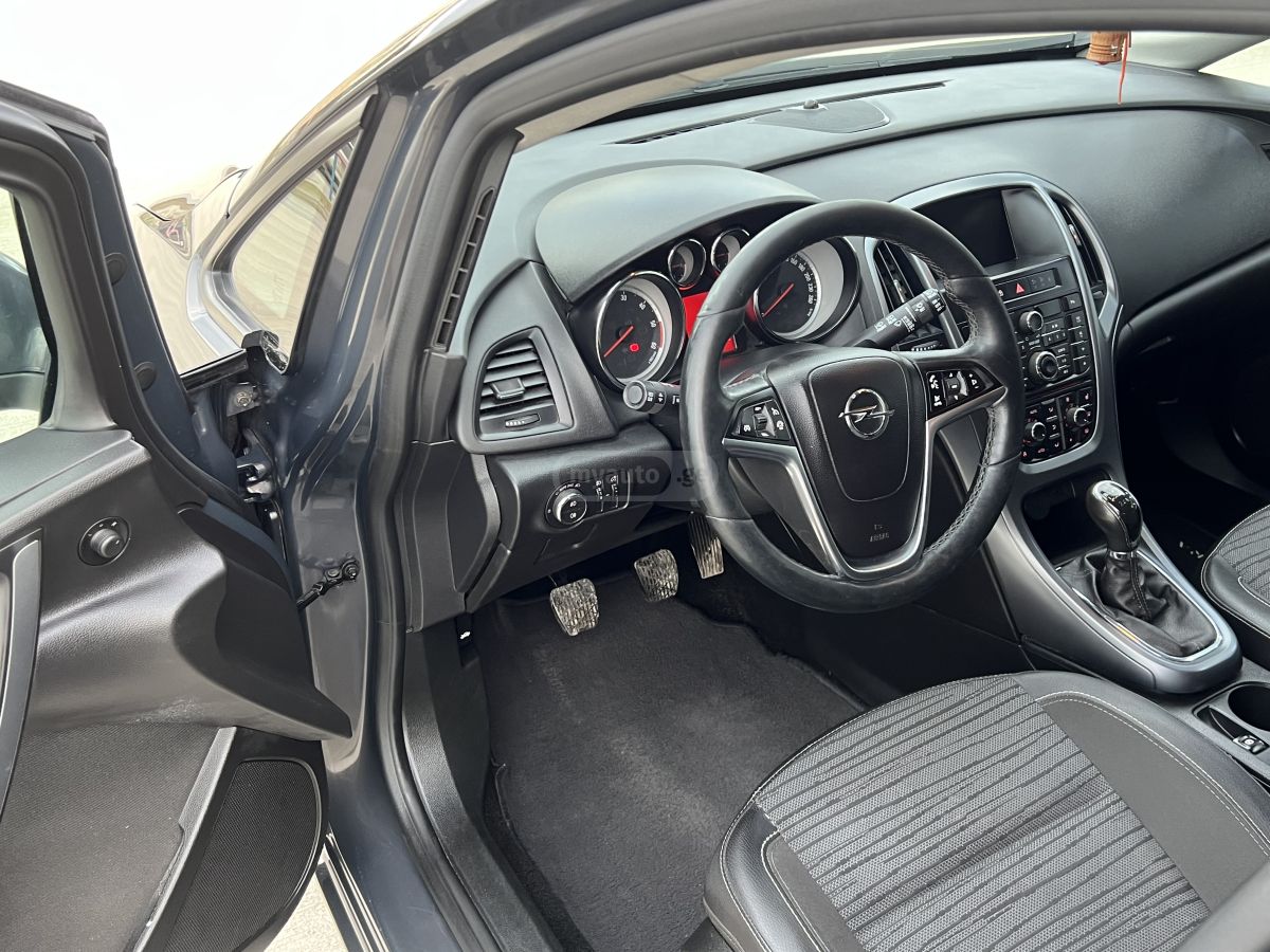 Opel Astra - фото 12