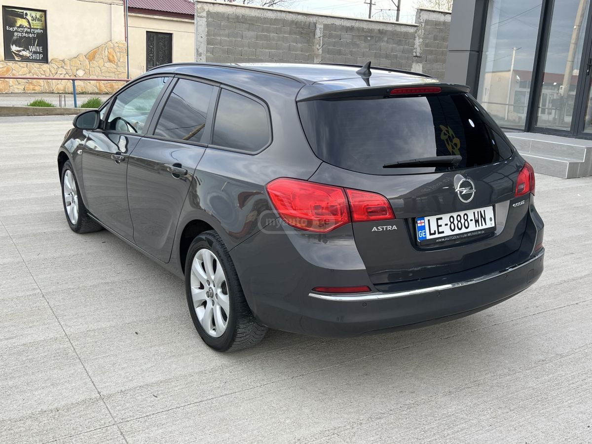 Opel Astra - фото 5