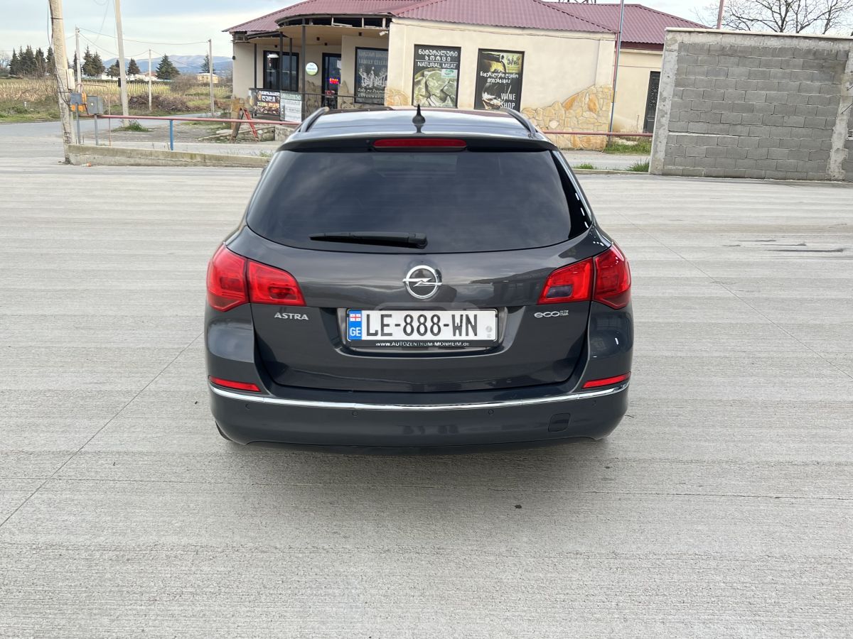Opel Astra - фото 6