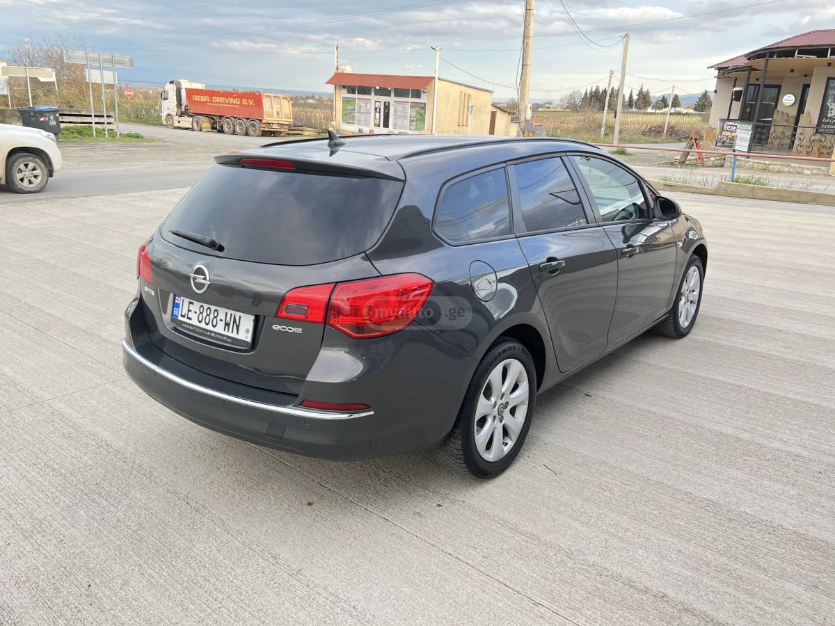 Opel Astra - фото 7