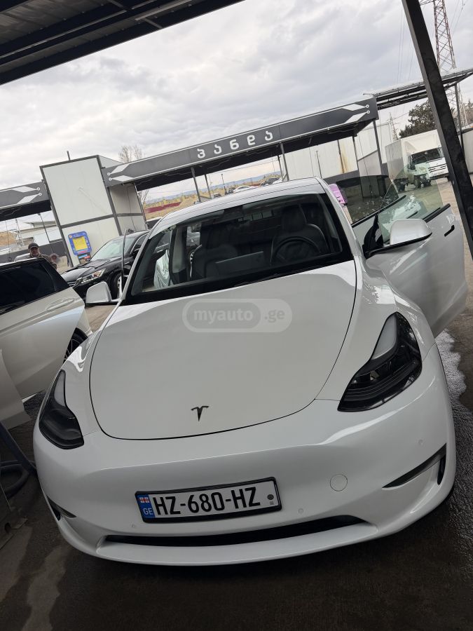 Tesla Model Y - фото 15