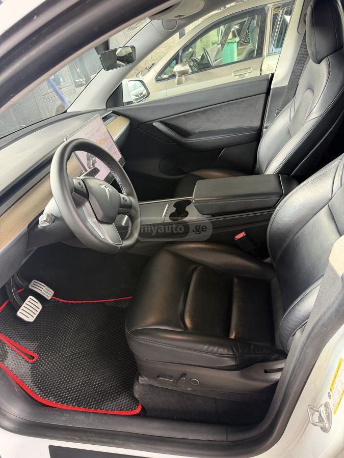 Tesla Model Y - фото 6