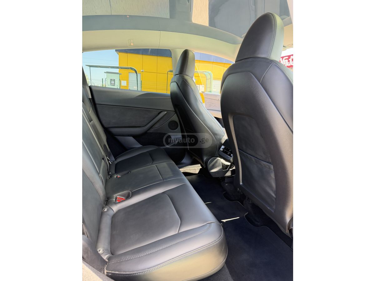 Tesla Model Y - фото 12