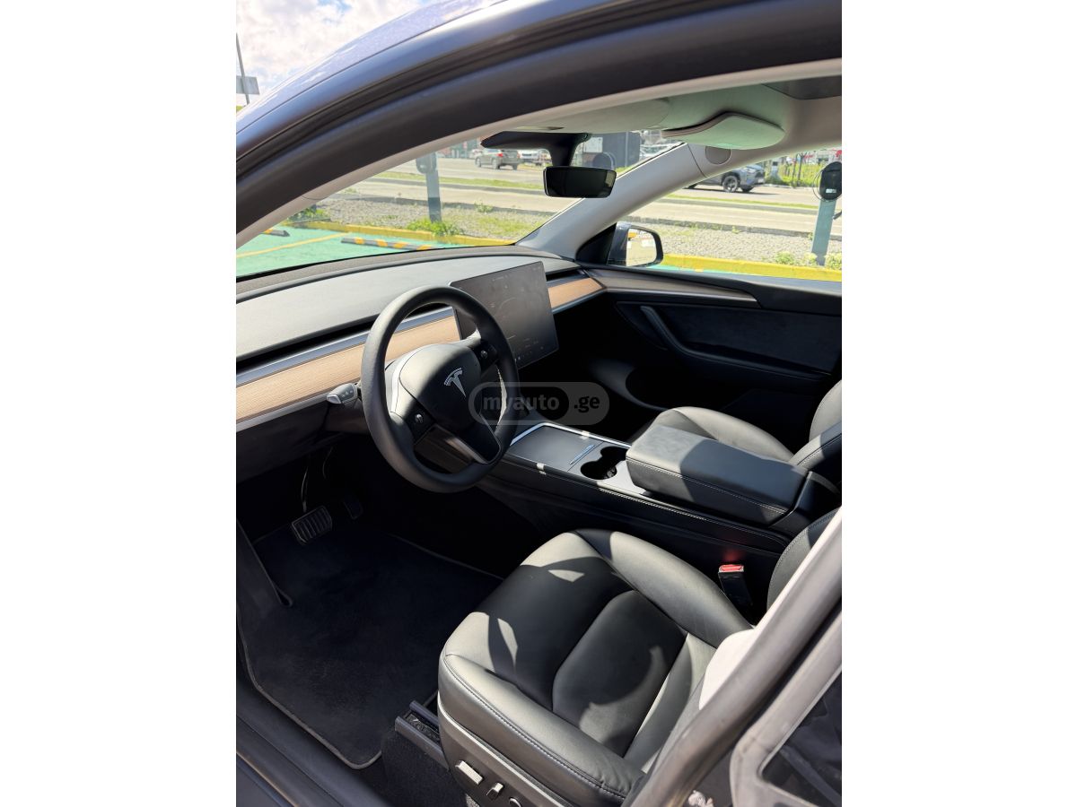 Tesla Model Y - фото 13