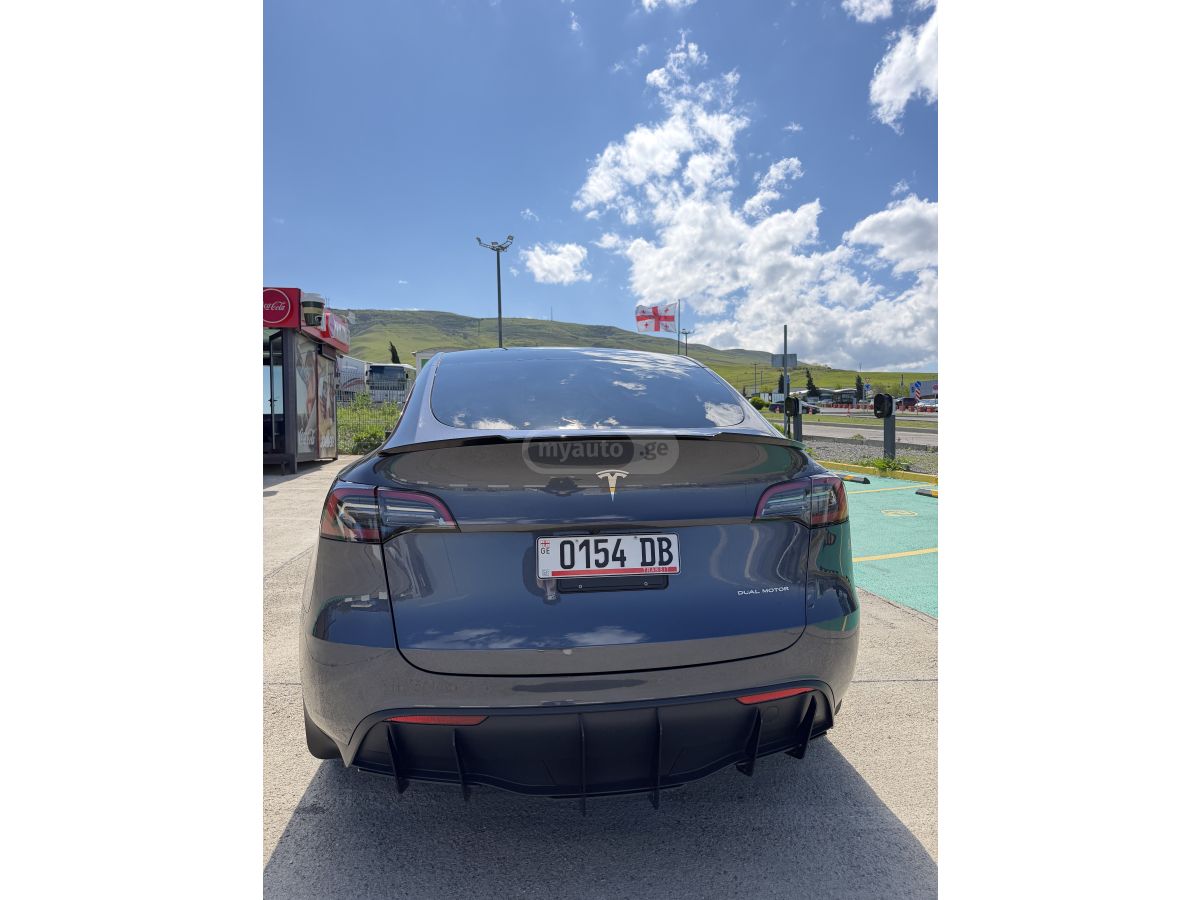 Tesla Model Y - фото 6