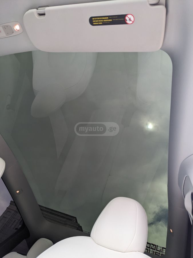 Tesla Model Y - фото 14