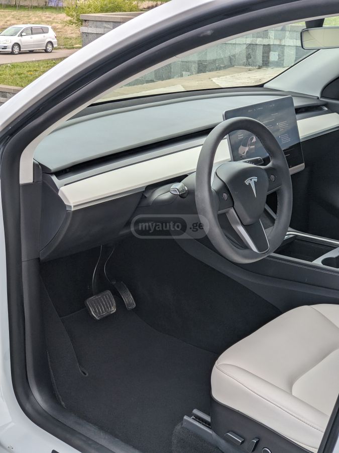 Tesla Model Y - фото 9