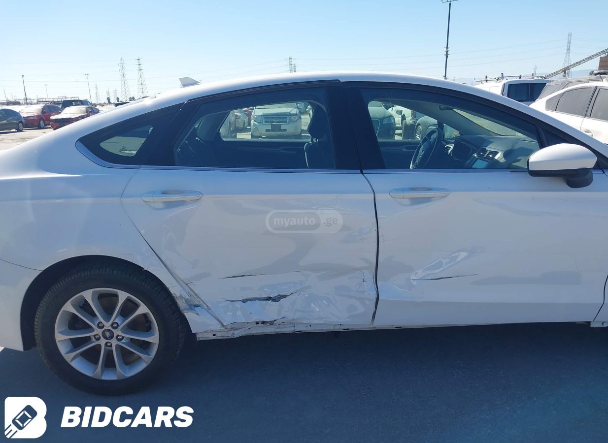 Ford Fusion - фото 6