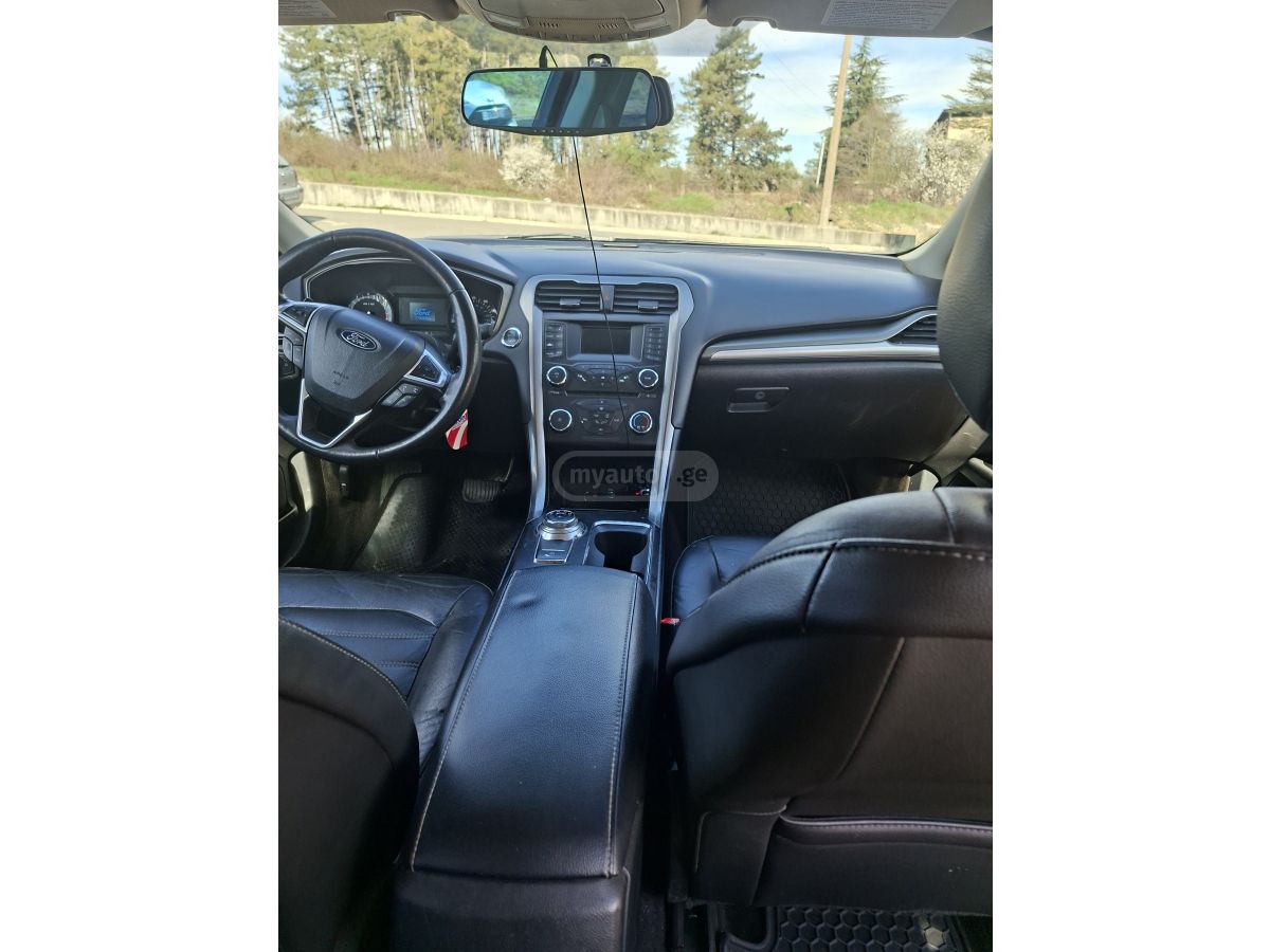 Ford Fusion - фото 7