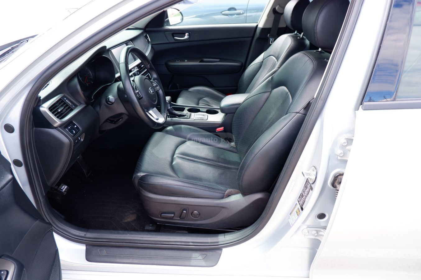 Kia Optima - фото 11