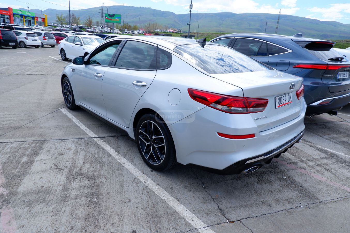 Kia Optima - фото 7
