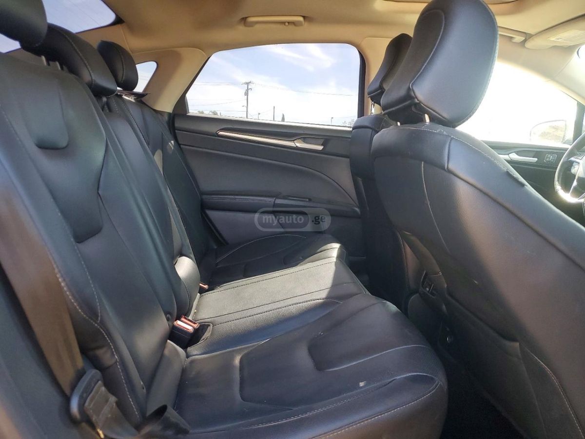 Ford Fusion - фото 10