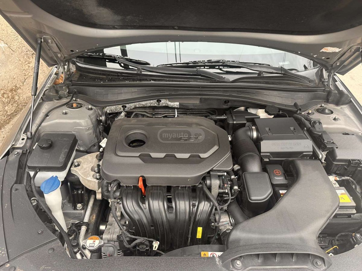 Kia Optima - фото 7