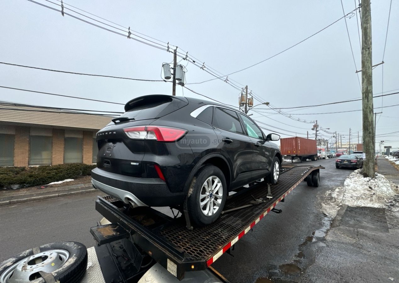 Ford Escape - фото 1