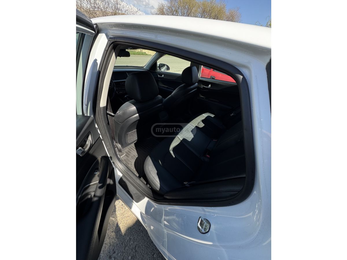 Kia Optima - фото 11