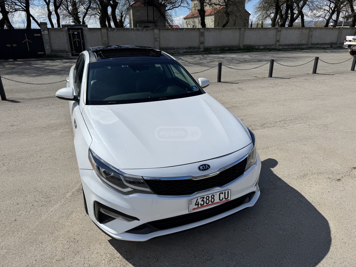 Kia Optima - фото 8