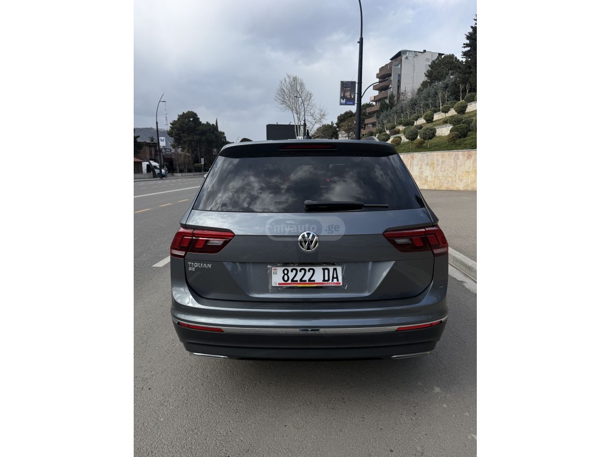 Volkswagen Tiguan - фото 11