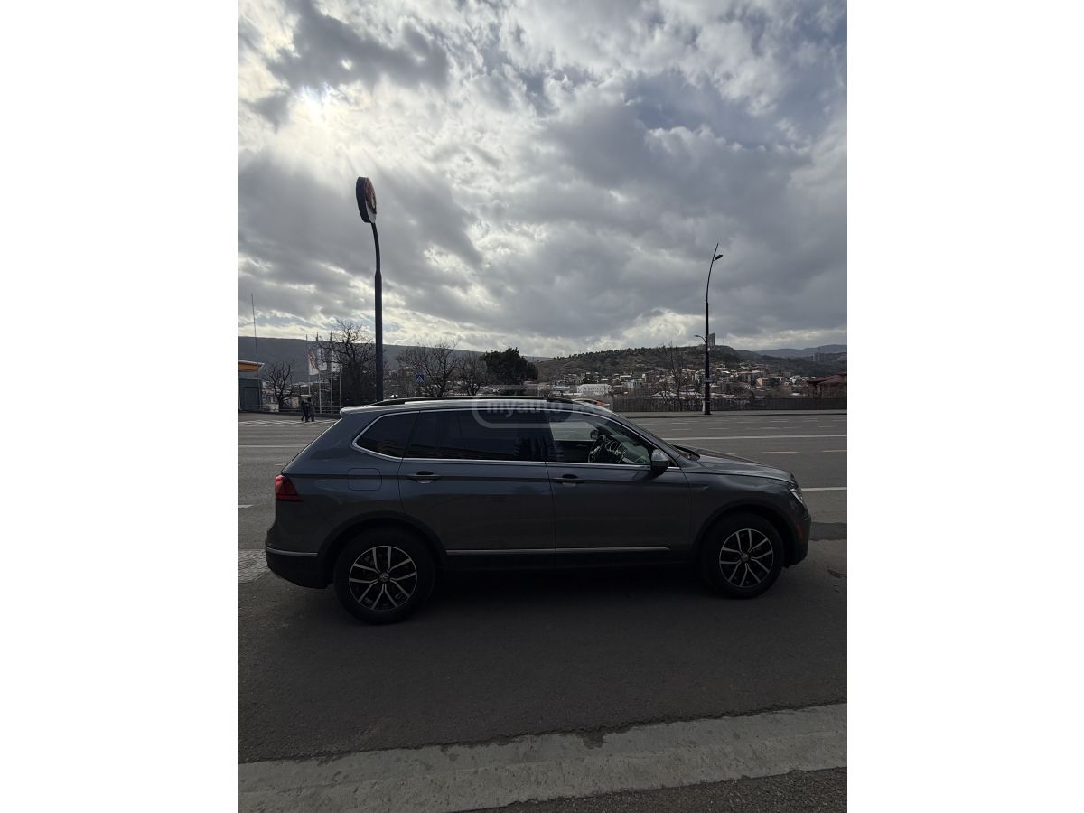 Volkswagen Tiguan - фото 12